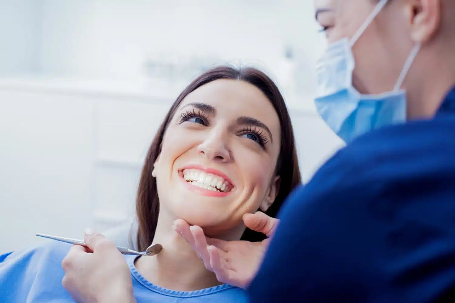 Female Dentist In Action